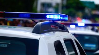 Crews rescue driver trapped in flood water