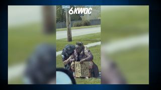  Davenport police officer seen comforting woman