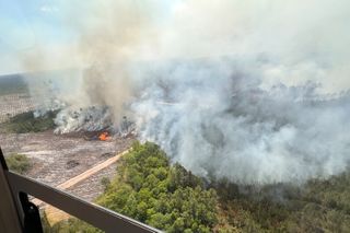 A fast-growing Georgia wildfire tops 31 square miles, with evacuations possible