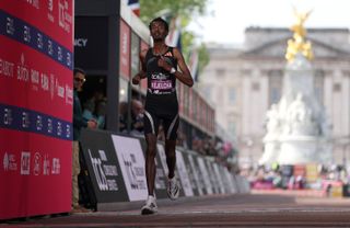 Yomif Kejelcha broke the 2-hour marathon but got 2nd place. He's still happy