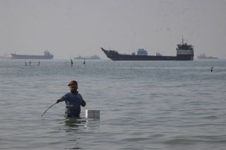 Trump says the US will 'guide' stranded ships from the Strait of Hormuz