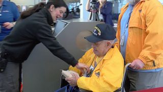 WWII veteran, 102, attends his first Honor Flight as Honor Flight of the Quad Cities celebrates its 65th