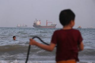 U.S. military says it intercepted Iranian attacks on 3 Navy ships in Strait of Hormuz