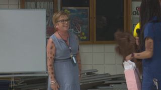  Harrison Elementary teacher wears 63 tattoos for school fundraiser