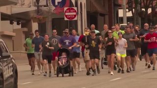  Quad Cities law enforcement officers run torch relay for Special Olympics