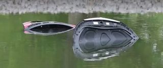 Vehicle rolls into pond in Bettendorf