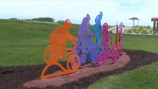 Legendary QC cyclists honored with new sculpture in Schwiebert Park