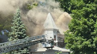  Smoke billows from Davenport house fire