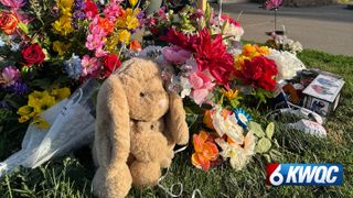  Memorial grows outside home for Muscatine shooting victims