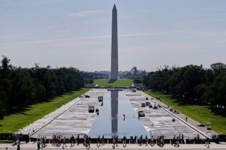 After D.C.'s Reflecting Pool gets repainted, visitors ask: What changed?