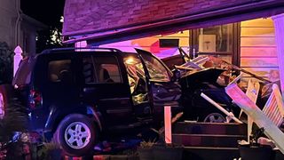  Vehicle crashes into Davenport home