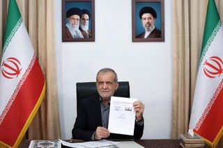 What you need to know about the preliminary U.S.-Iran agreement signed by Trump