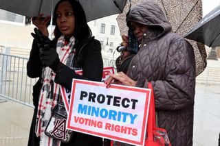 Supreme Court allows a ruling that ends a tool to protect minority voters in 7 states
