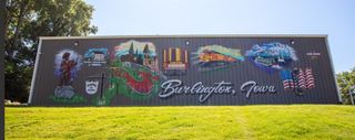 New mural with nod to Burlington's history brightens corner