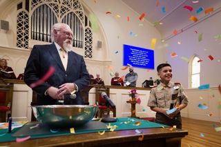 These church members disagree on politics. Together they're wiping out medical debt