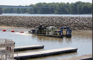 City of Muscatine resumes dredging on at Municipal Harbor