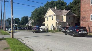 Large police presence on Taylor Street, part of road blocked
