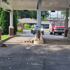 Vehicle strikes GECU building, Rock Island