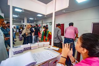 Most people who need glasses don't have them. Can the post office change that?