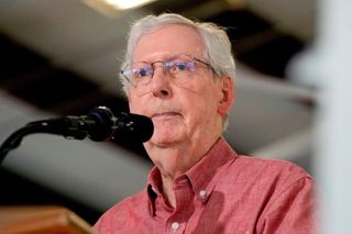 McConnell says a fall led to his hospitalization, breaking weeks of silence