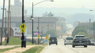  Wildfire smoke brings haze, air quality alert to Quad Cities
