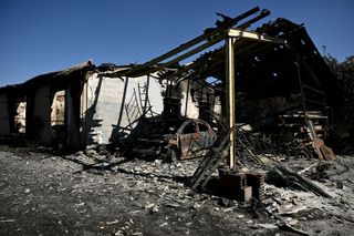 Photos: Spain and France's battle record wildfires