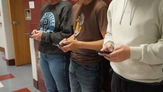  Pritzker signs school cellphone ban to avoid student distractions