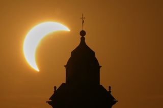 Millions crowd cities to see Spain's first total solar eclipse in over a century