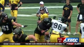  Iowa quarterback battle on display at Kids’ Day