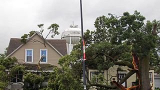  Pritzker tours storm damage, signs flood relief bill expanding local Chicago programs 