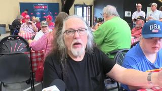 Iowa cancer patient presses midterm candidates on drug costs