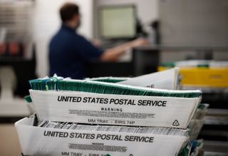 Whistleblower claims USPS plan for Trump's mail voting order could 'derail' midterms
