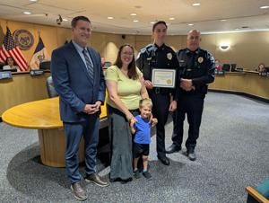 Davenport swears in three police officers