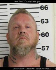 Davenport man arrested after allegedly harassing, stalking woman