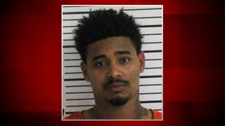  Davenport police: Stolen gun with extended magazine found during traffic stop