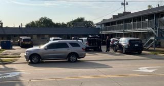 Police establish crime-scene tape at Bettendorf motel