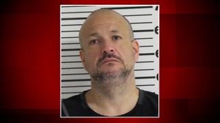 Bettendorf man accused of assaulting woman, barricading himself in motel room
