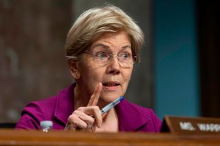 Warren demands Trump officials explain removing a ban on interference in census data