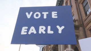  Quad Cities group marches to encourage people to vote as early voting opens