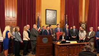 Gov. Reynolds signs $15 billion steel deal, but not without opposition