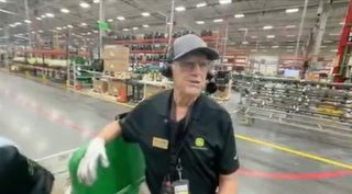 Retired Deere employee still comes to work as tour guide at Iowa facility