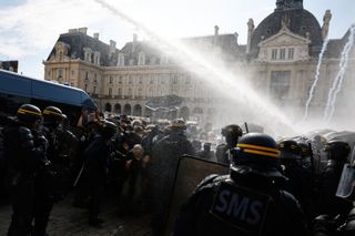 France's police fire tear gas and water cannons as school protests sweep the country