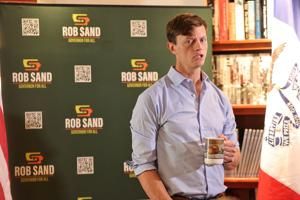 After debate, Rob Sand takes questions at Davenport coffee shop