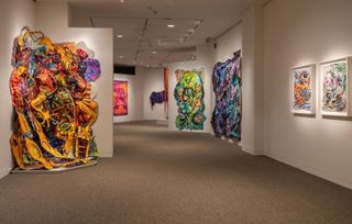 Immersive drawing collage installation adorning the walls of the Figge Art Museum in a new exhibit