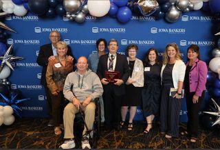 Iowa Bankers Association honors Ricci, Clinton National Bank, for 50 years of service