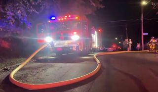 Firefighters, police at scene of blaze in abandoned Davenport home