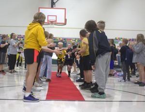 Buffalo Elementary rolls out red carpet for Iowa football kid captain