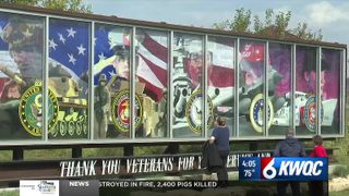  Students honor Quad Cities veterans with songs and new mural